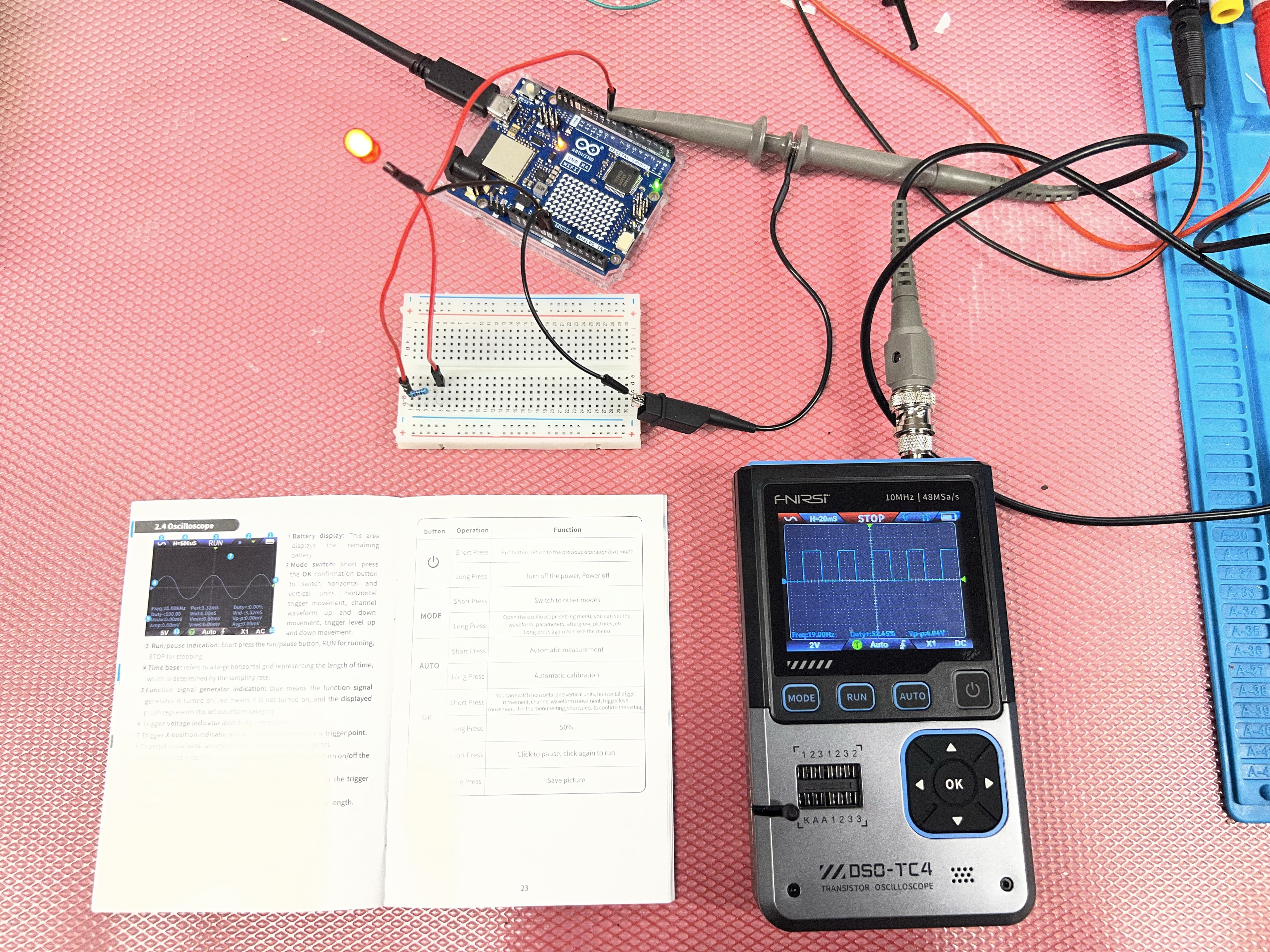 Arduino UNO, breadboard, LED, and DSO-TC4 showing a square wave